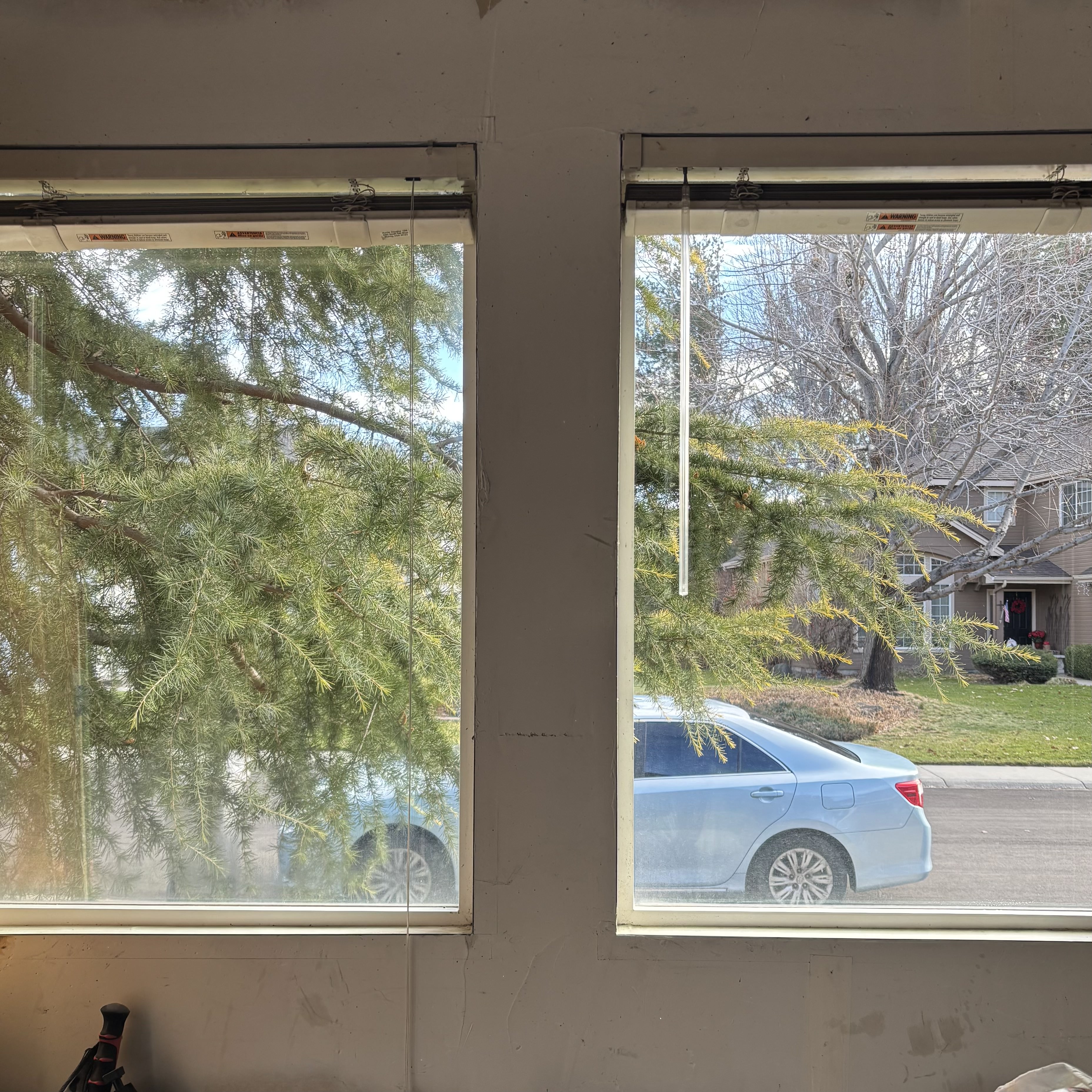 After Seymour's window washing at a luxury home in Highlands, showing sparkling clean results.