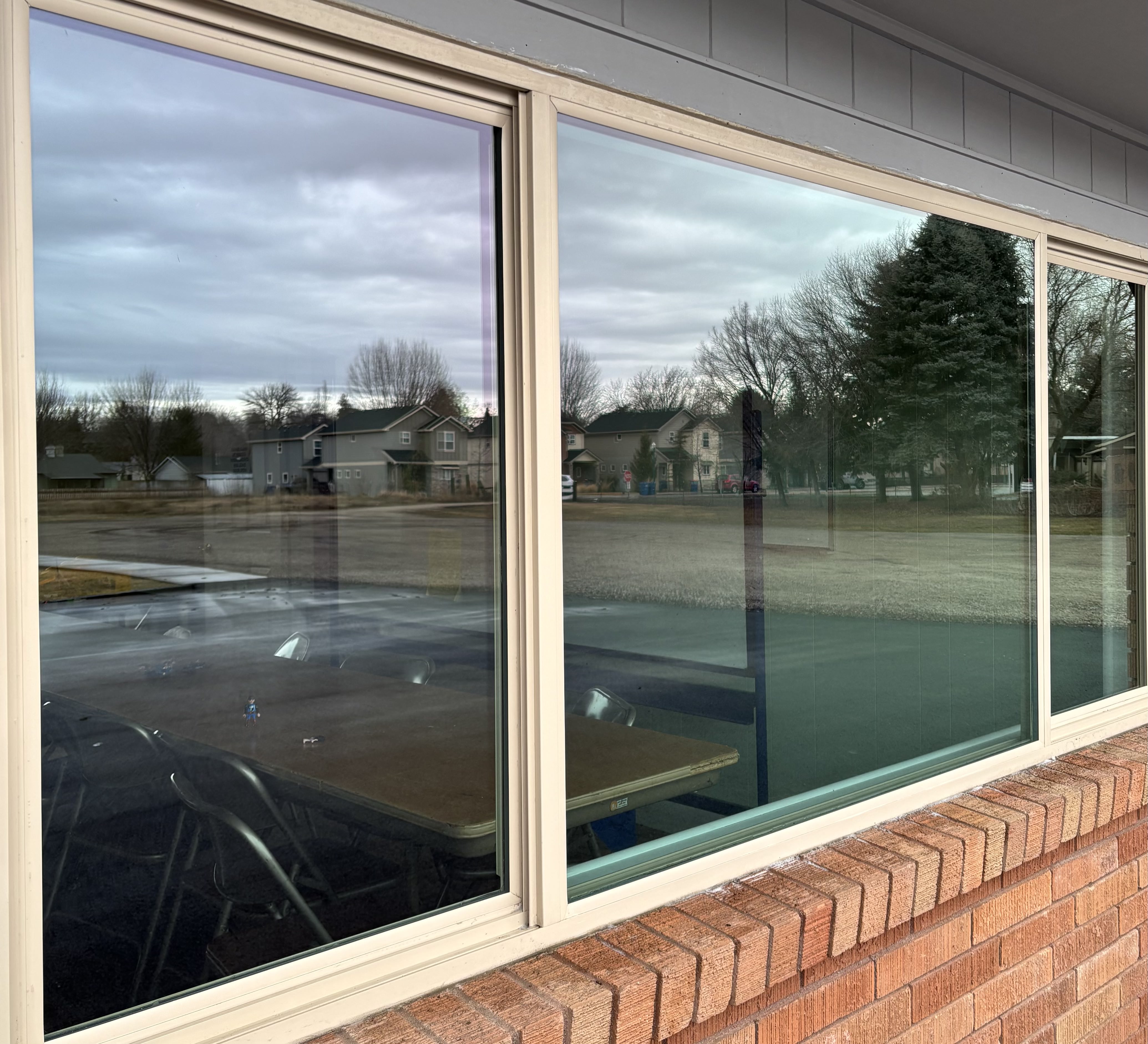 After Seymour's window washing at a luxury home in Quail Ridge, showing sparkling clean results.