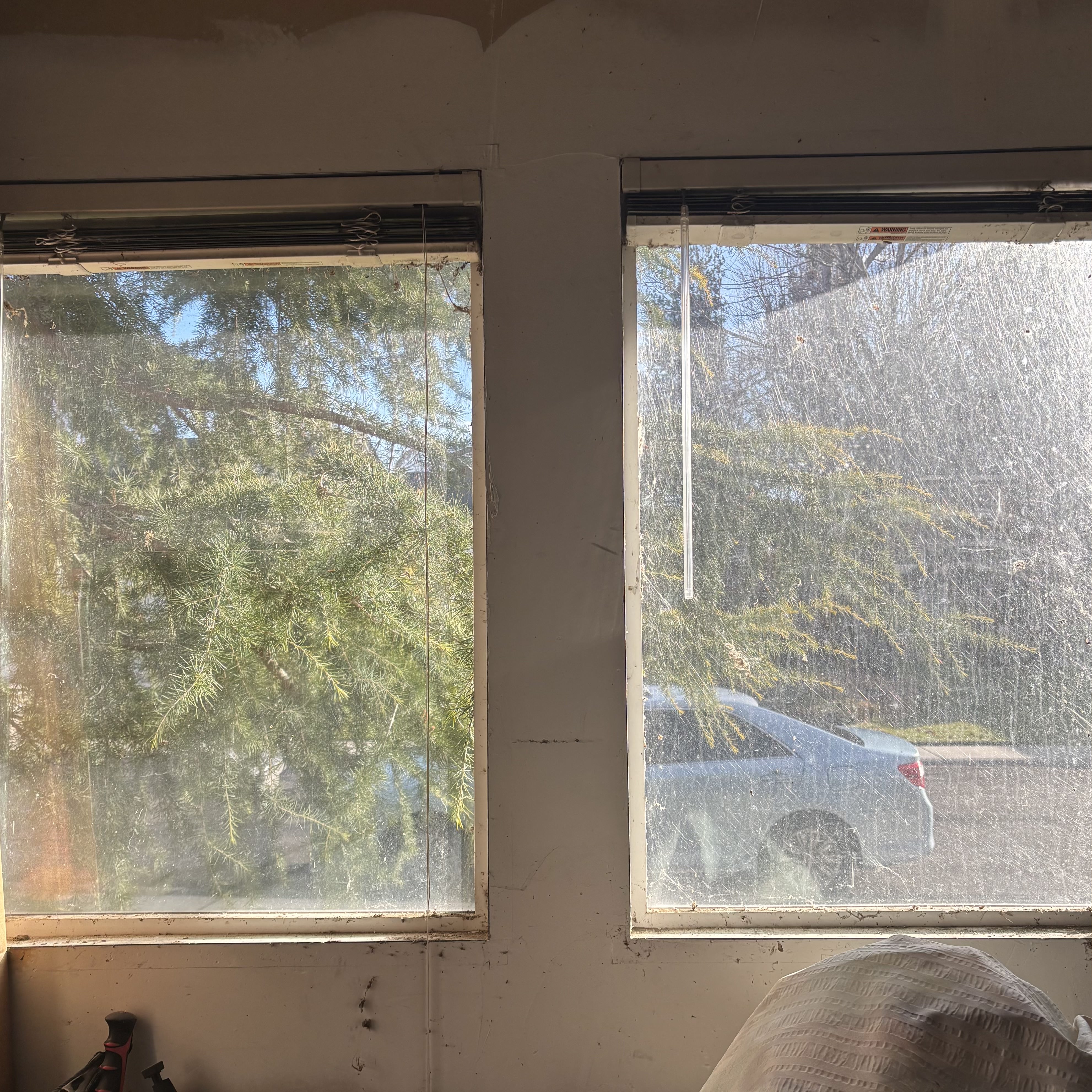 Before window cleaning at a luxury home in Highlands.