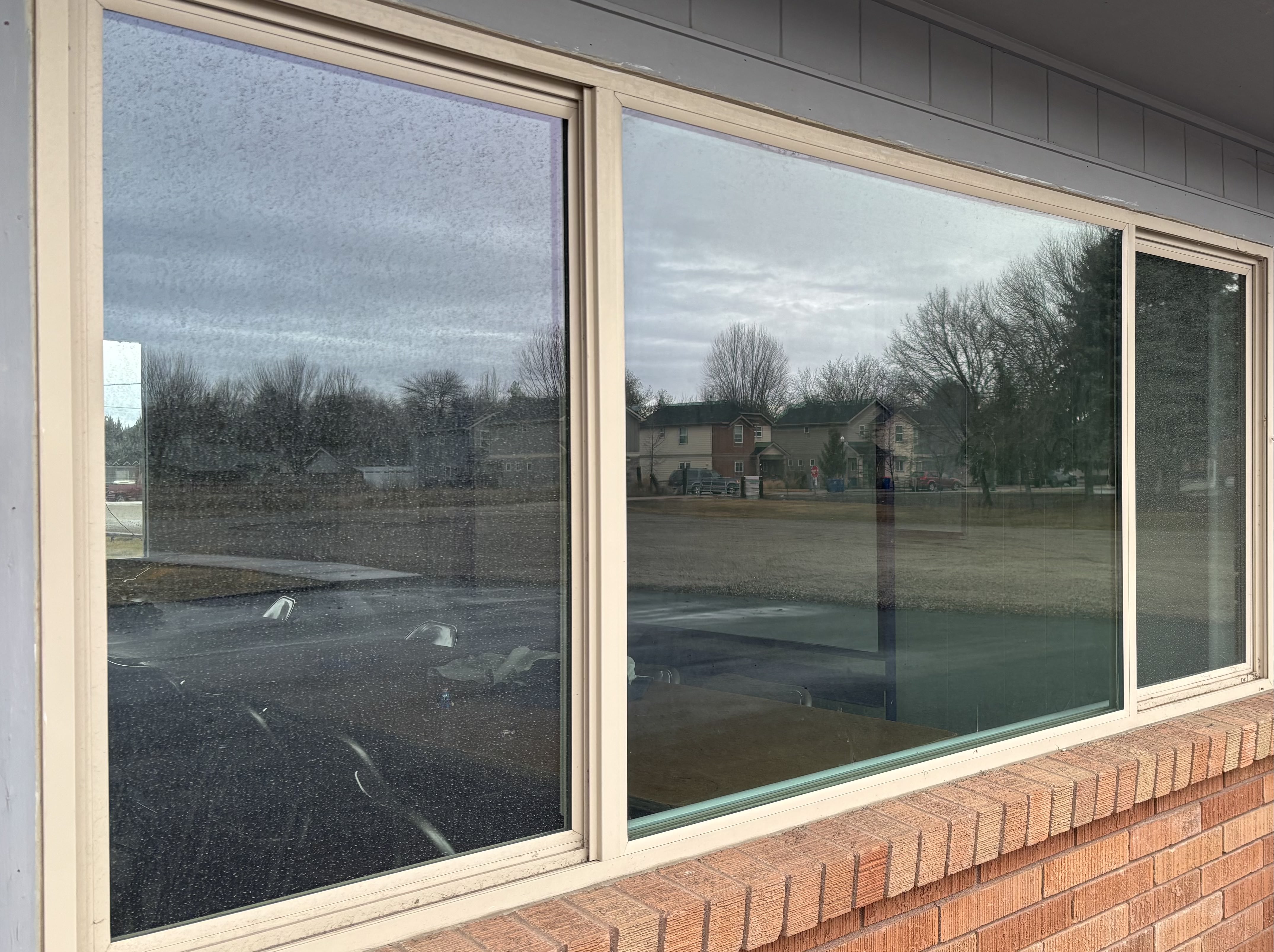 Before window cleaning at a luxury home in Quail Ridge.