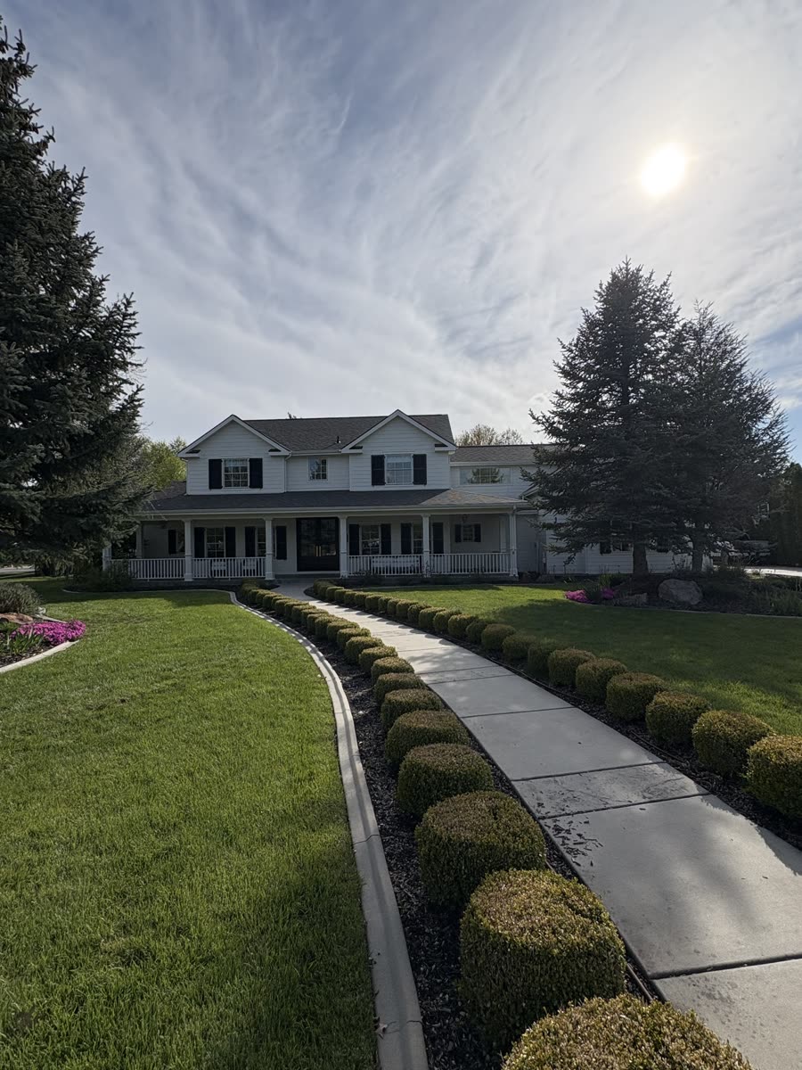 An estate home in Eagle at the end of a long hedged walk