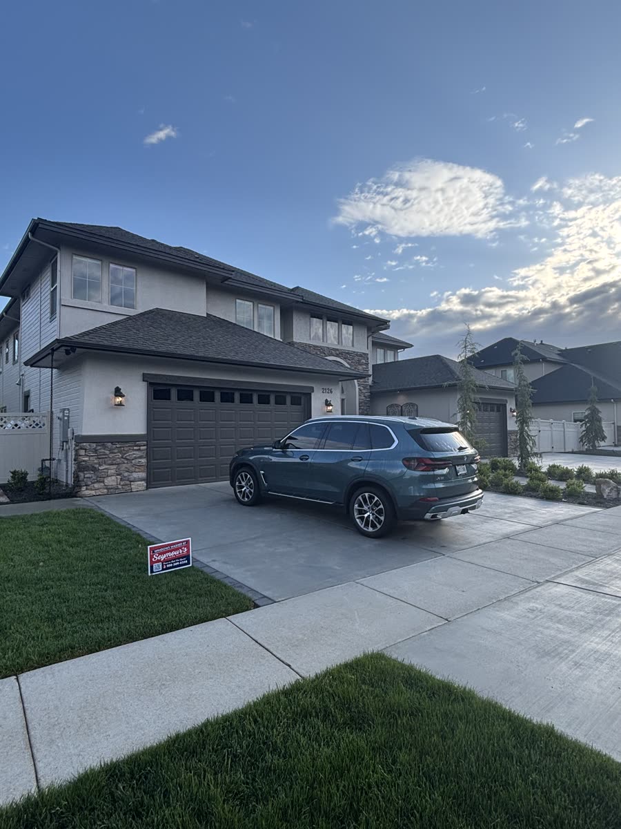 A two-story home in Meridian at dusk