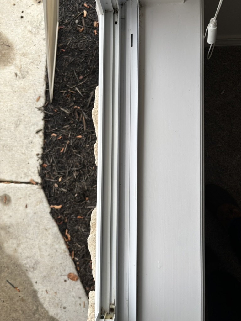 A window track after detailing, the channel scrubbed clean and the screen out