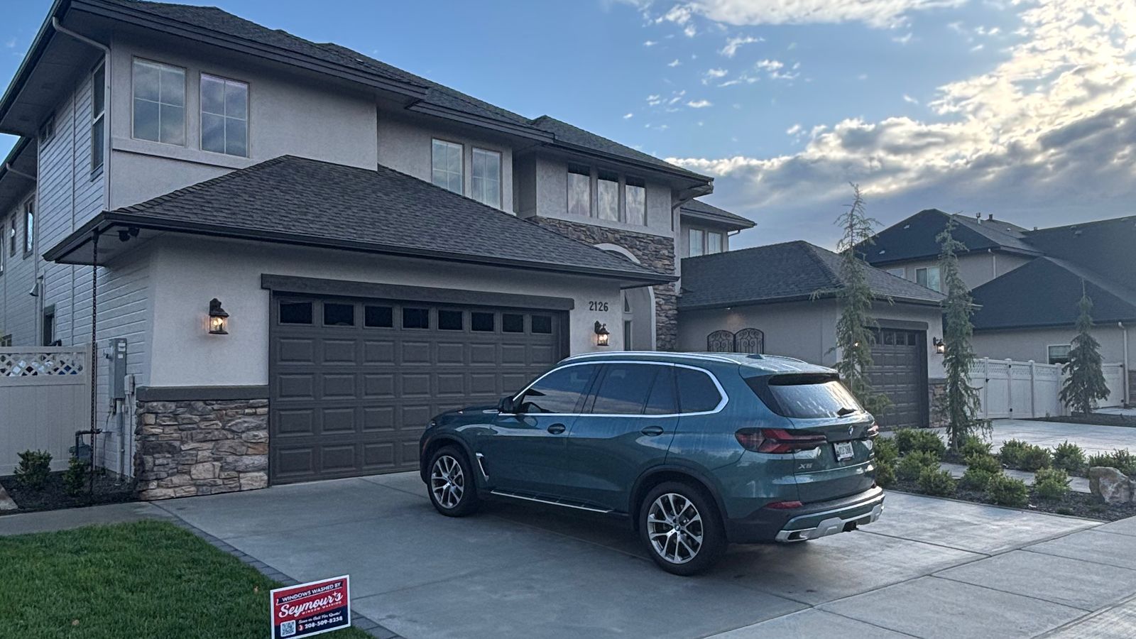 A Meridian home with a Seymour's yard sign at the edge of the driveway